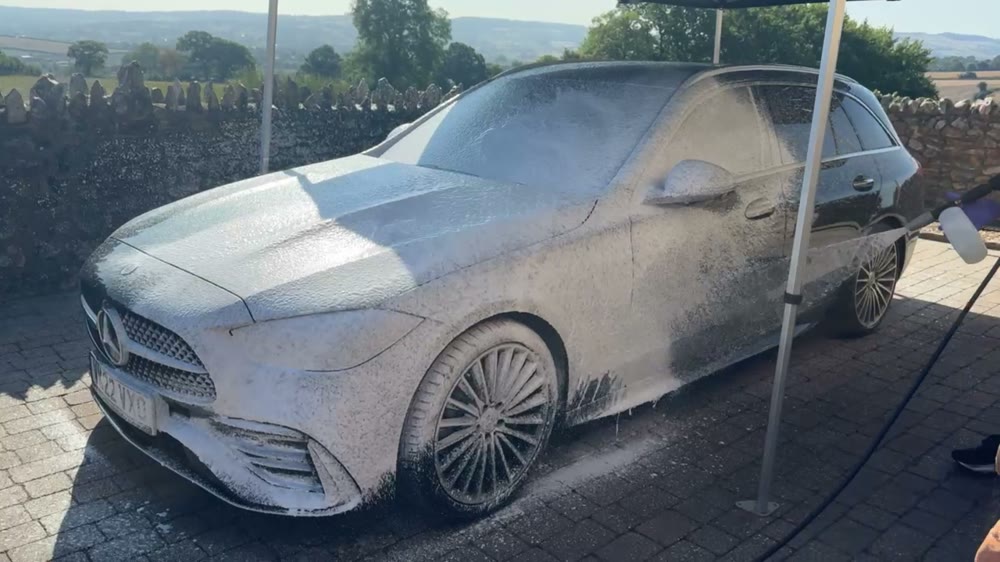 Snow foam being applied to a Mercedes estate during a Yarty Valet clean